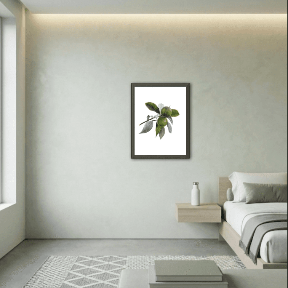 Twin Limes framed on a soft green wall in a minimal bedroom